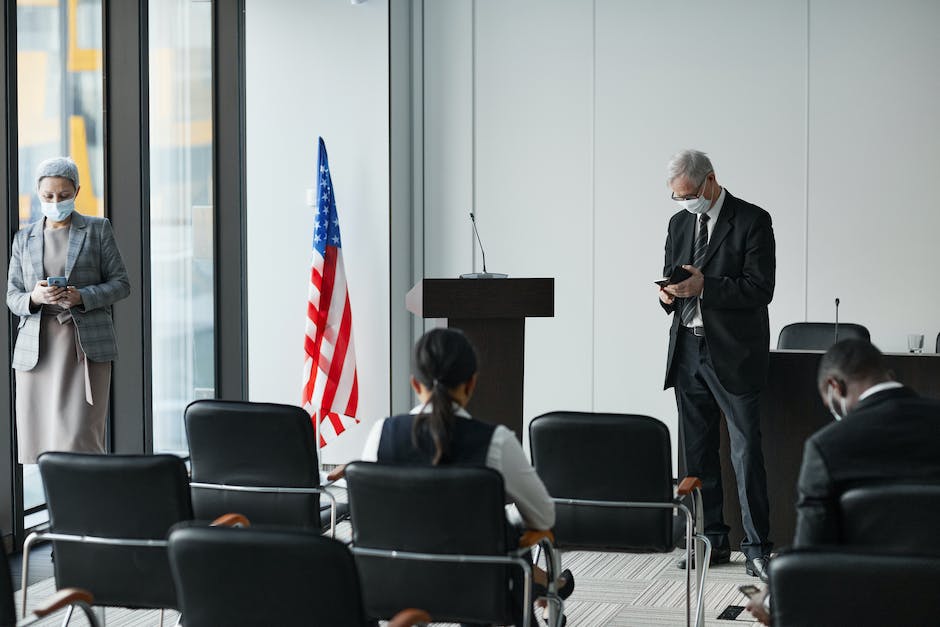 A group of workers wearing protective suits and masks during asbestos removal